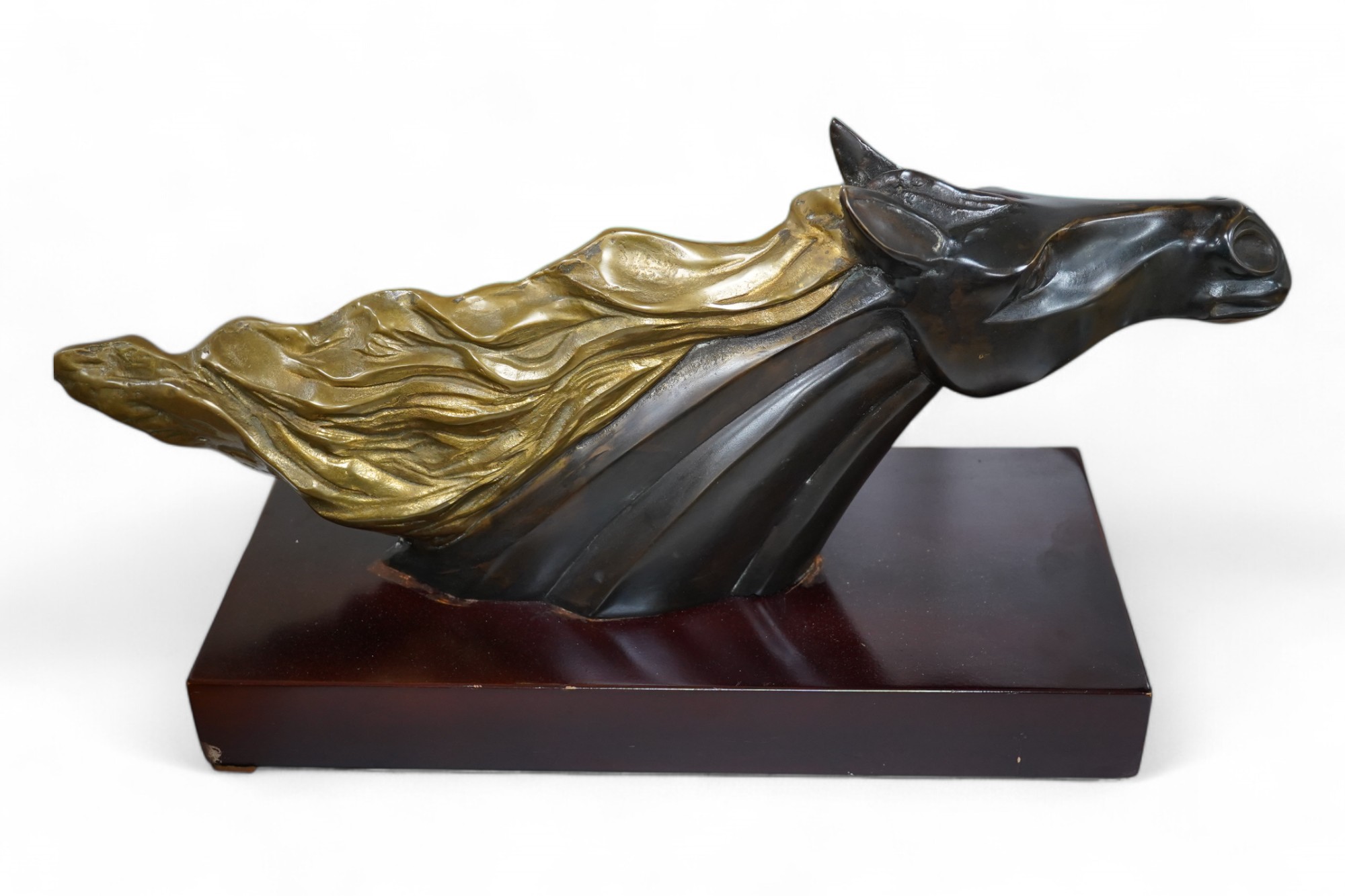 A French Art Deco patinated brass model of a horses head, unsigned, 60cm wide. Condition - fair to good